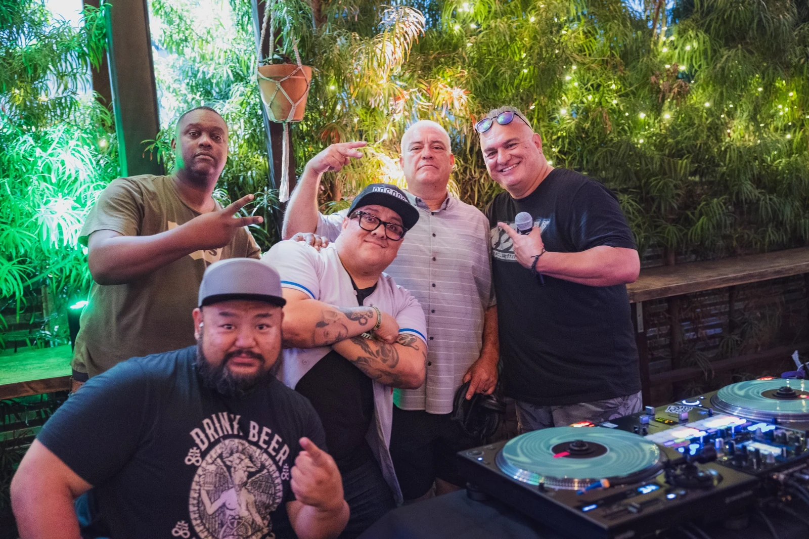 Members of Groove Syndicate posing with DJ Tony G at L.A. Tardeada